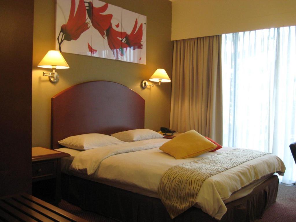 Casuarina Hotel Кота Кинабалу Стая снимка