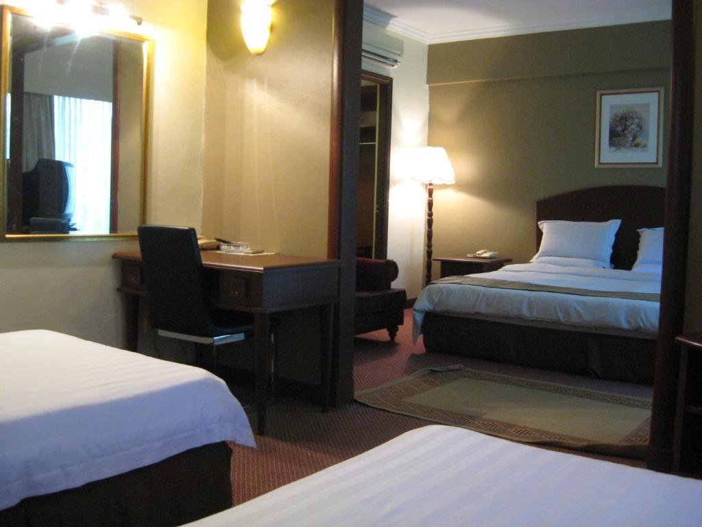 Casuarina Hotel Кота Кинабалу Стая снимка