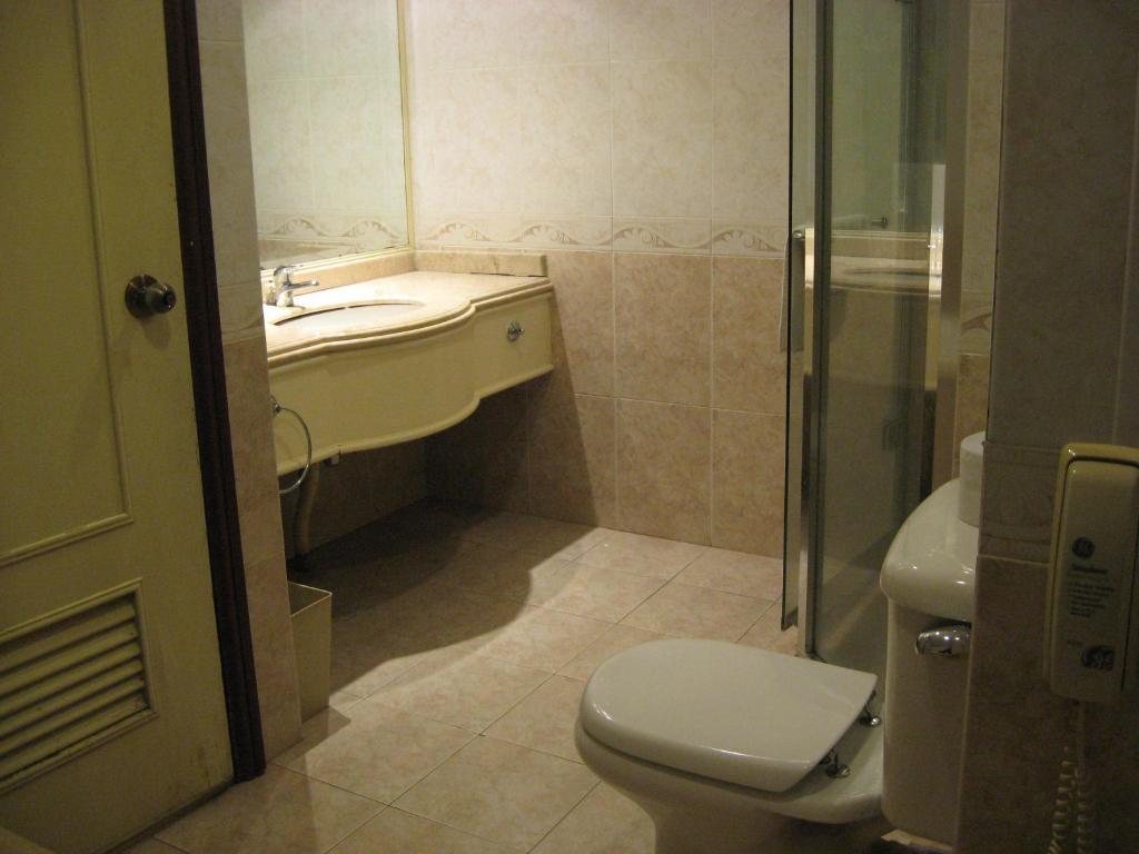 Casuarina Hotel Кота Кинабалу Стая снимка