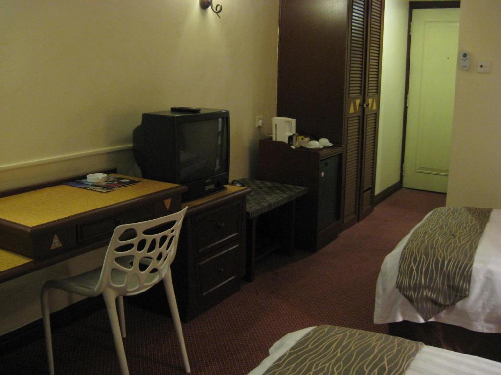 Casuarina Hotel Кота Кинабалу Стая снимка